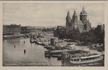 AMSTERDAM - Prins Hendrikkade met St. Nicolaaskerk