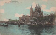 AMSTERDAM - Prins Hendrikkade met St. Nicolaaskerk