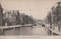 AMSTERDAM-Versiering-ter-gelegenheid-van-het-eerste-bezoek-van-H.-M.-de-Koningin-met-H.-K.-H.-Prinses-Juliana-aan-Amsterdam-in-Mei-1910