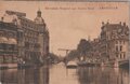 AMSTERDAM-Kloveniers-Burgwal-met-Doelen-Hotel