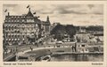 AMSTERDAM-Damrak-met-Victoria-Hotel